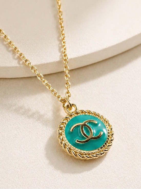 CHANEL Jewelry - Authentic CHANEL Gold Turquoise Enamel Logo Necklace Pendant